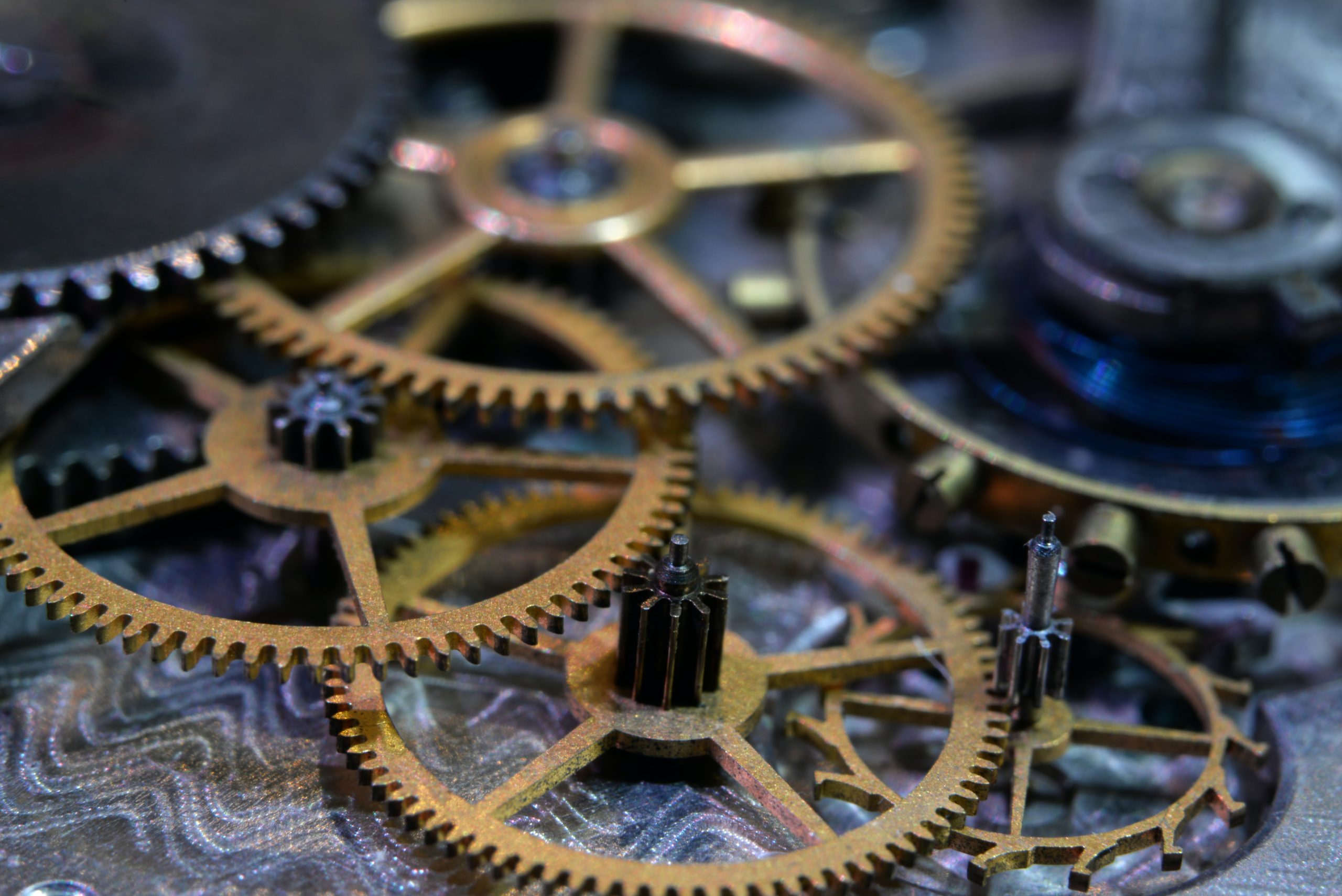 cogs and gears to represent the elements involved in the partnership admission process
