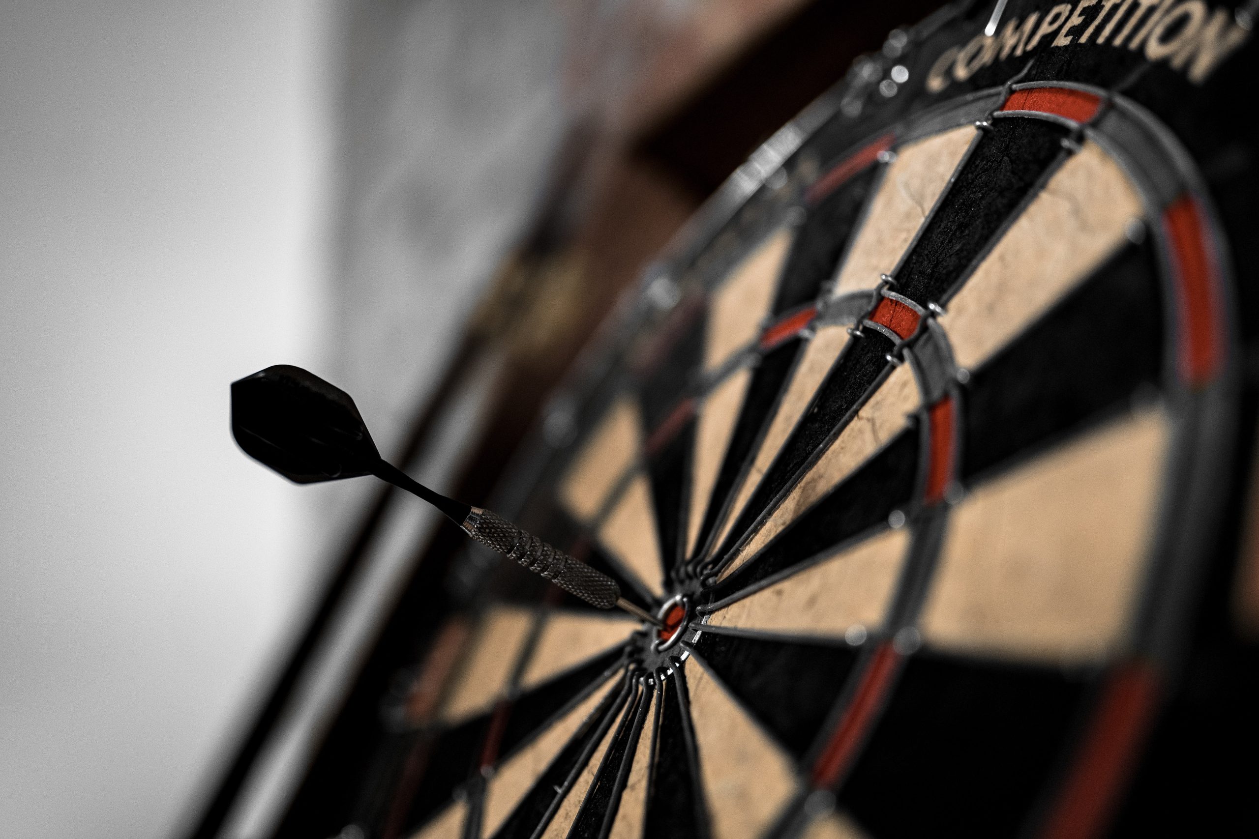 a dart in a bullseye to symbolize how to improve your tender win rate