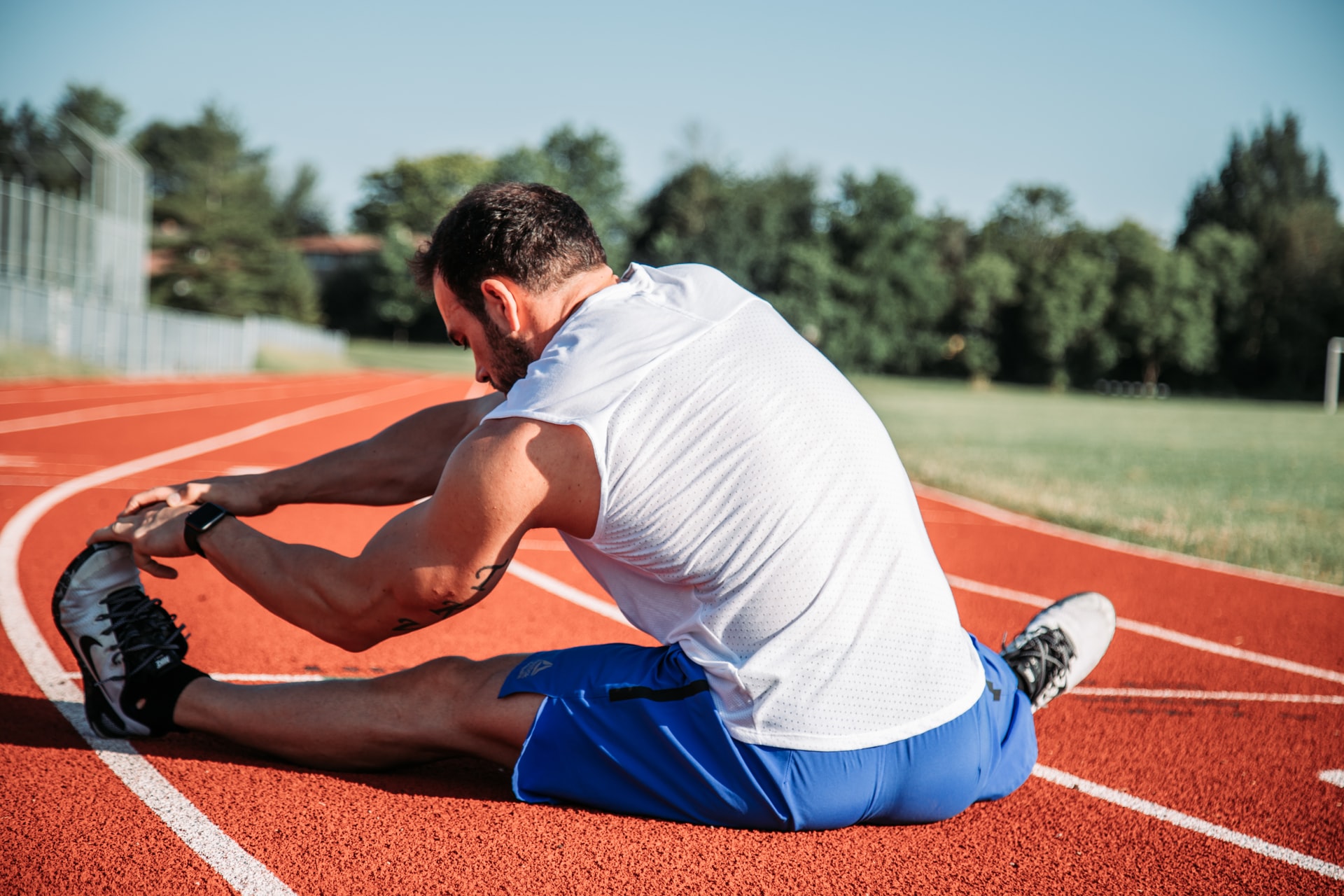 a runner stretching to represent not preparing for the partnership admissions process