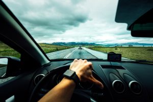 view from the steering wheel of a car to represent why you need to prepare your virtual team for the long haul