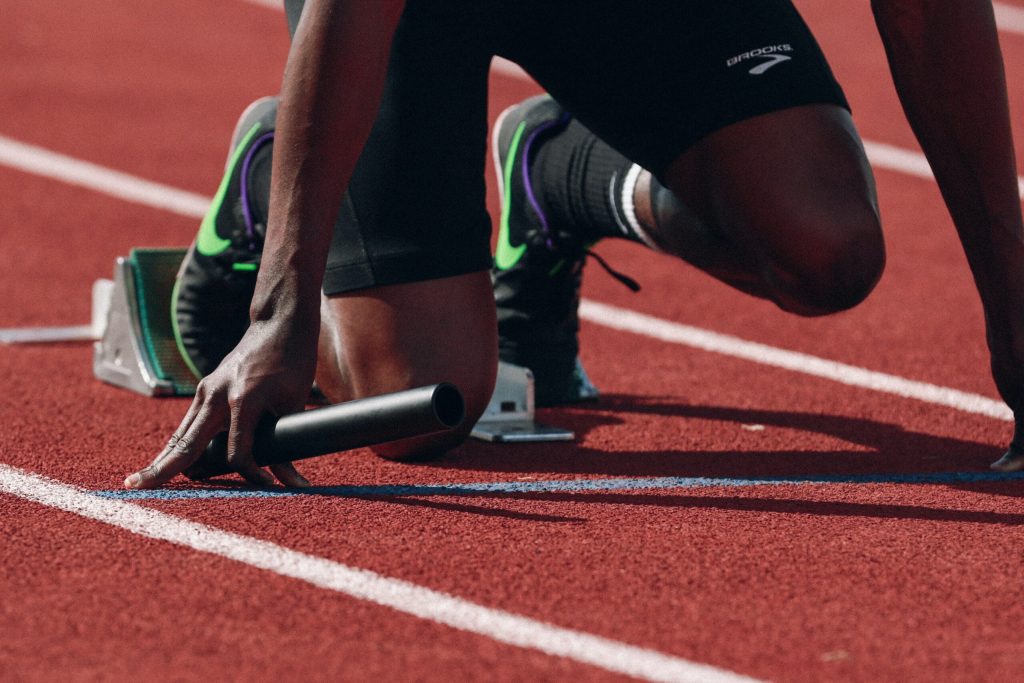 a runner at the starting block to represent taking action if you're thinking should i look for a new job