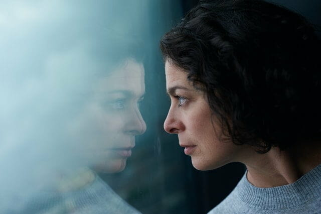 a woman looking anxious
